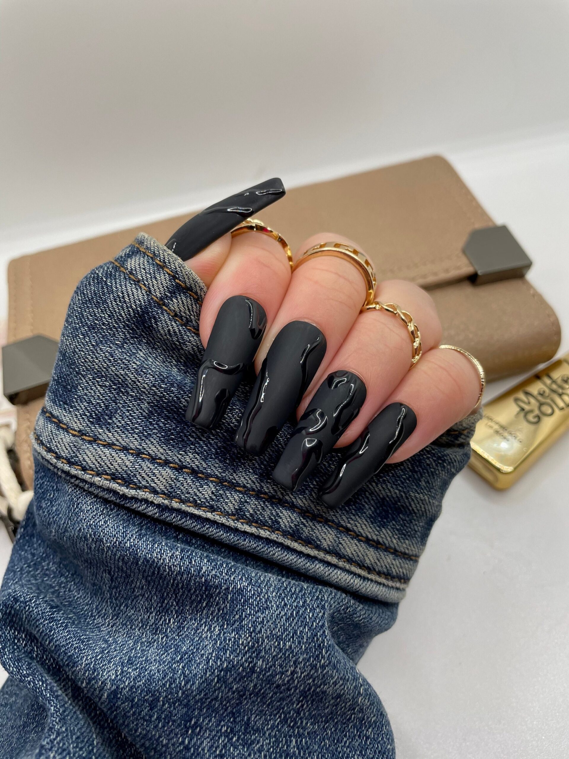 Unleash Your Edgy Side With Chic Matte Black Nail Designs